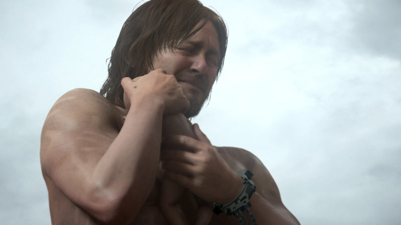 norman reedus holding a bayby